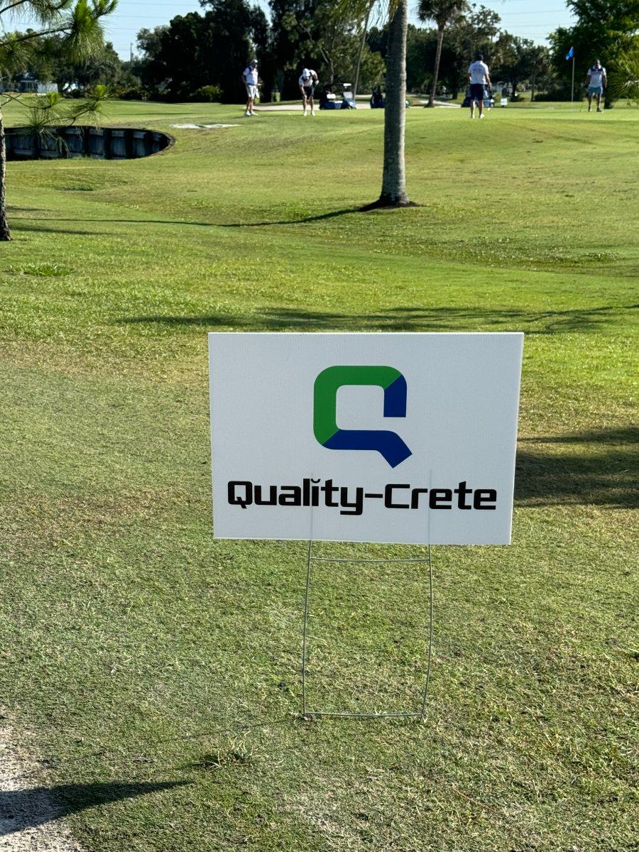 Quality-Crete sponsor sign on a golf course