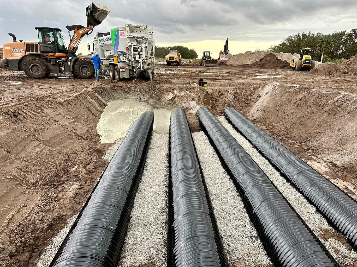 Volumetric mixer truck batching concrete at a Southwest Florida jobsite