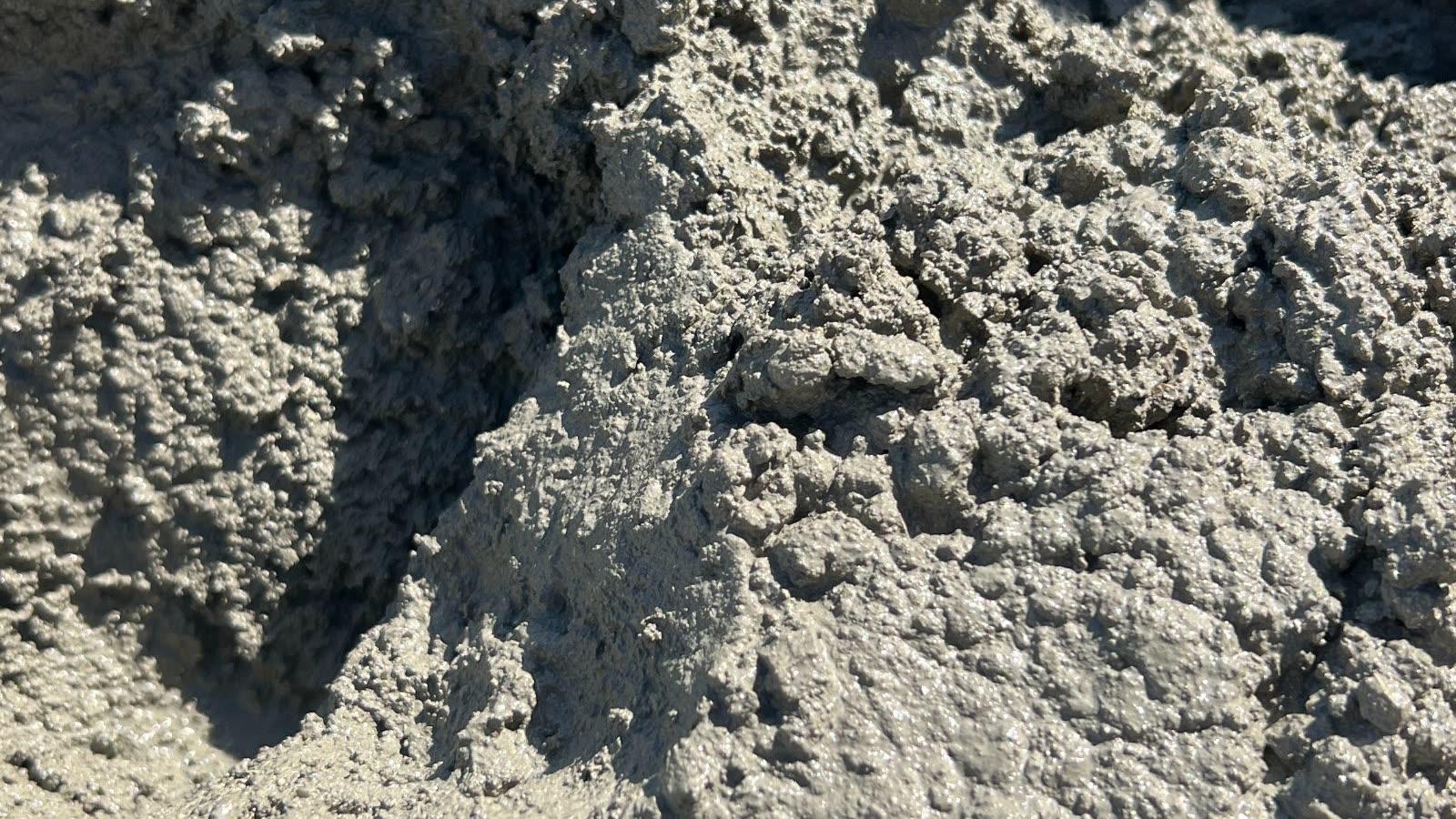 Freshly mixed concrete aggregate on a jobsite
