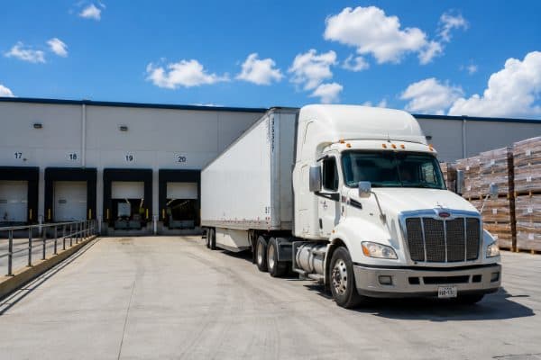 Delivery truck at a warehouse loading dock