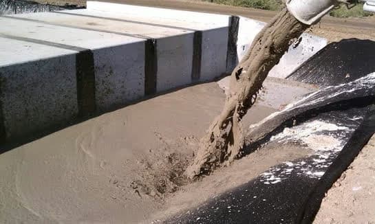Flowable fill poured into a utility trench